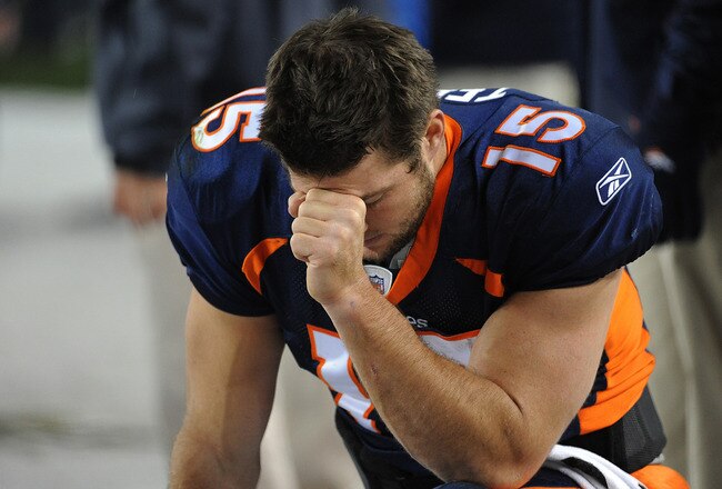 DENVER, CO - NOVEMBER 17: Tim Tebow #15 of the Denver Broncos prays during the final minute of the game against the New York Jets at Sports Authority Field at Mile High on November 17, 2011 in Denver, Colorado.  (Photo by Garrett W. Ellwood/Getty Images)