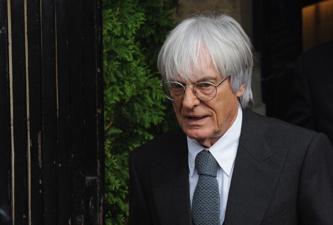 PARIS, FRANCE - SEPTEMBER 21:  Formula One commercial rights-holder Bernie Ecclestone leaves the F.I.A headquarters after attending the World Motor Sport Council hearing on September 21, 2009 in Paris, France. Renault will not contest the charges that Nelson Piquet Jr. was ordered by management to deliberately crash his car during the Singapore Formula 1 Grand Prix, the crash caused the deployment off the safety car, due to team mate Fernando Alonso's race strategy he was able to win the race. The incident has already seen the resignation of  team principal  Flavio Briatore and Director of Engineering, Pat Symonds. The punishment from the FIA could be exclusion of the team from F1, a large fine or a suspended ban.   (Photo by Pascal Le Segretain/Getty Images)