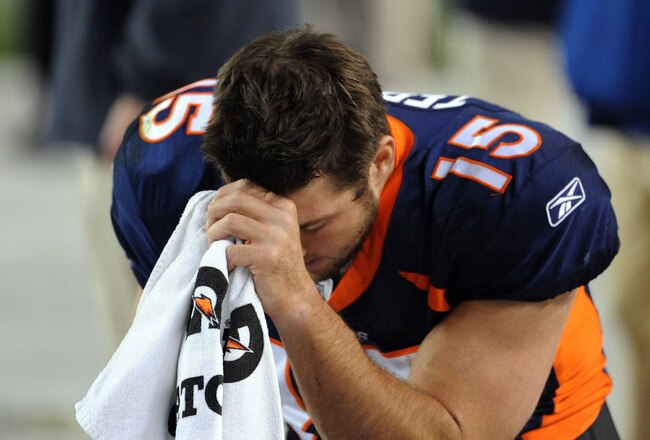DENVER, CO - NOVEMBER 17: Tim Tebow #15 of the Denver Broncos prays during the final minute of the game against the New York Jets at Sports Authority Field at Mile High on November 17, 2011 in Denver, Colorado.  (Photo by Garrett W. Ellwood/Getty Images)