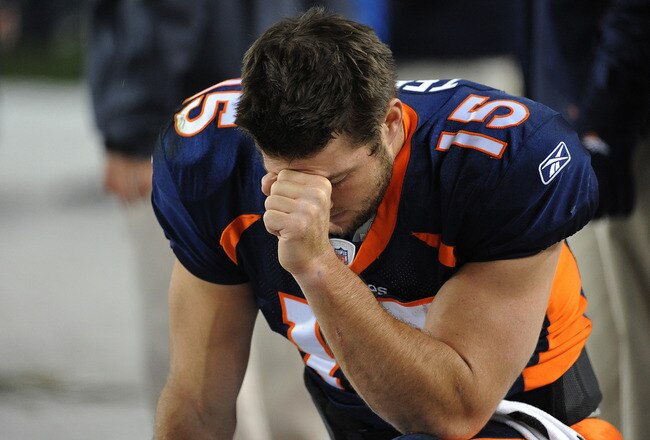 DENVER, CO - NOVEMBER 17: Tim Tebow #15 of the Denver Broncos prays during the final minute of the game against the New York Jets at Sports Authority Field at Mile High on November 17, 2011 in Denver, Colorado.  (Photo by Garrett W. Ellwood/Getty Images)