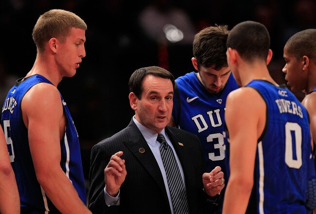 NEW YORK - NOVEMBER 15:  Head coach Mike Krzyzewski of the Duke Blue Devils talks with his team during a time out against the Michigan State Spartans during the 2011 State Farms Champions Classic at Madison Square Garden on November 15, 2011 in New York City.  (Photo by Chris Trotman/Getty Images)