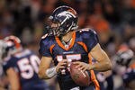 DENVER, CO - NOVEMBER 17:  Quarterback Tim Tebow #15 of the Denver Broncos rolls out against the New York Jets at Sports Authority Field at Mile High on November 17, 2011 in Denver, Colorado. Tebow went on to score the game winning touchdown as the Broncos defeated the Jets 17-13.  (Photo by Doug Pensinger/Getty Images)