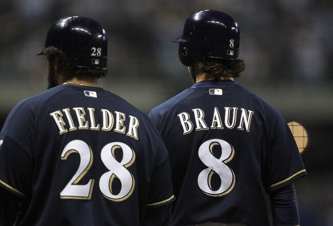 MILWAUKEE, WI - OCTOBER 10:  (L-R) Prince Fielder #28 and Ryan Braun #8 of the Milwaukee Brewers stand on the field against the St. Louis Cardinals during Game Two of the National League Championship Series at Miller Park on October 10, 2011 in Milwaukee, Wisconsin. The Cardinals won 12-3. (Photo by Jonathan Daniel/Getty Images)