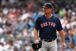 NEW YORK, NY - SEPTEMBER 25:  Tim Wakefield #49 of the Boston Red Sox walks to the dugout against the New York Yankees on September 25, 2011 at Yankee Stadium in the Bronx borough of New York City.  (Photo by Nick Laham/Getty Images)