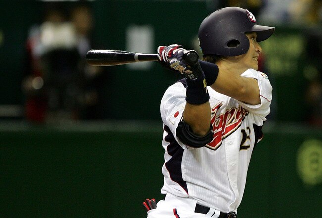 TOKYO - MARCH 05:  Outfielder Norichika Aoki  #23 of Japan hits one-run double at the bottom of the third inning of World Baseball Classic Tokyo Round match between Japan and China at Tokyo Dome on March 5, 2009 in Tokyo, Japan.  (Photo by Koji Watanabe/Getty Images)