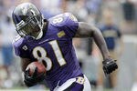 BALTIMORE, MD - AUGUST 06:  Anquan Boldin #81 of the Baltimore Ravens carries the ball during training camp at M&T Bank Stadium on August 6, 2011 in Baltimore, Maryland.  (Photo by Rob Carr/Getty Images)