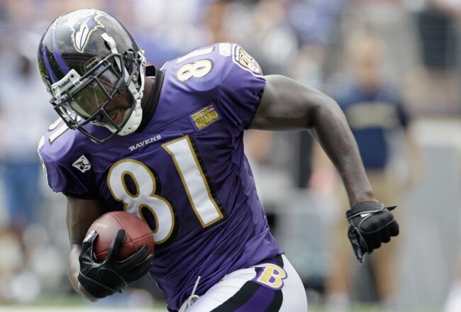 BALTIMORE, MD - AUGUST 06:  Anquan Boldin #81 of the Baltimore Ravens carries the ball during training camp at M&T Bank Stadium on August 6, 2011 in Baltimore, Maryland.  (Photo by Rob Carr/Getty Images)