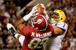 TUSCALOOSA, AL - NOVEMBER 05:  Eric Reid #1 of the LSU Tigers makes a catch over Michael Williams #89 of the Alabama Crimson Tide for an interception during the second half of the game at Bryant-Denny Stadium on November 5, 2011 in Tuscaloosa, Alabama.  (Photo by Kevin C. Cox/Getty Images)