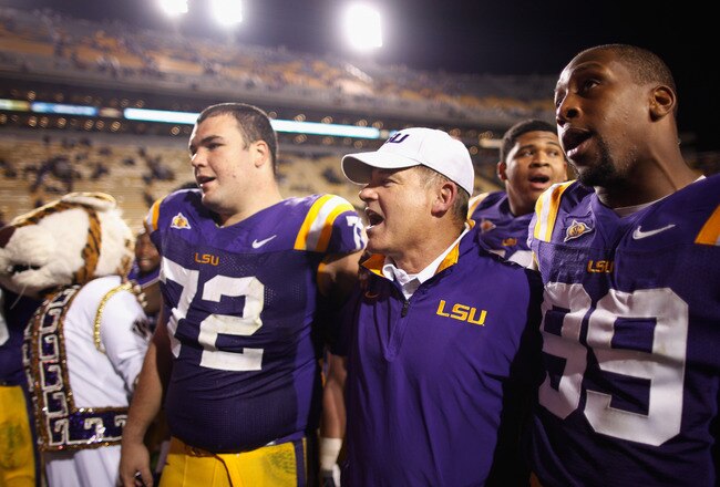 BATON ROUGE, LA - NOVEMBER 12:  Head coach Les Miles of the Louisiana State University Tigers celebrates after defeating the Western Kentucky Hilltoppers 42-9 at Tiger Stadium on November 12, 2011 in Baton Rouge, Louisiana.  (Photo by Chris Graythen/Getty Images)
