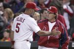 ST. LOUIS - MAY 12:  Manager Tony LaRussa #10 of the St. Louis Cardinals celebrates with Albert Pujols #5 after the game against the Arizona Diamondbacks on May 12, 2006 at Busch Stadium in St. Louis, Missouri. The Cardinals defeated the D-Backs 5-3.  (Photo by Elsa/Getty Images)