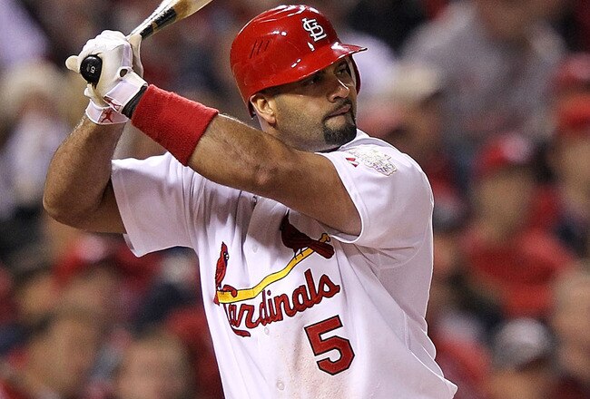 ST LOUIS, MO - OCTOBER 28: Albert Pujols #5 of the St. Louis Cardinals bats during Game Seven of the MLB World Series against the Texas Rangers at Busch Stadium on October 28, 2011 in St Louis, Missouri.  (Photo by Jamie Squire/Getty Images)