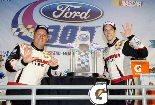 HOMESTEAD, FL - NOVEMBER 19:  Crew chief Todd Gordon and Brad Keselowski, driver of the #22 Discount Tire Dodge, celebrate in Victory Lane after winning the NASCAR Nationwide Series Ford 300 at Homestead-Miami Speedway on November 19, 2011 in Homestead, Florida.  (Photo by John Harrelson/Getty Images for NASCAR)