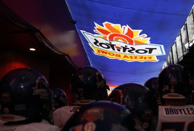 GLENDALE, AZ - JANUARY 04:  The Boise State Broncos enter the field to take on the TCU Horned Frogs before the Tostitos Fiesta Bowl at the Universtity of Phoenix Stadium on January 4, 2010 in Glendale, Arizona.  (Photo by Jed Jacobsohn/Getty Images)