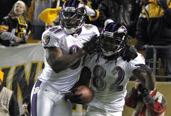 PITTSBURGH, PA - NOVEMBER 6:   Torrey Smith #82 of the Baltimore Ravens celebrates after catching a touchdown pass with Anquan Boldin #81 against the Pittsburgh Steelers during the game on November 6, 2011 at Heinz Field in Pittsburgh, Pennsylvania.  The Ravens defeated the Steelers 23-20.  (Photo by Justin K. Aller/Getty Images)