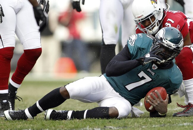 PHILADELPHIA, PA - NOVEMBER 13: Michael Vick #7 of the Philadelphia Eagles is tackled by Richard Marshall #31 of the Arizona Cardinals during a game at Lincoln Financial Field on November 13, 2011 in Philadelphia, Pennsylvania. The Cardinals defeated the Eagles 21-17. (Photo by Rich Schultz /Getty Images)