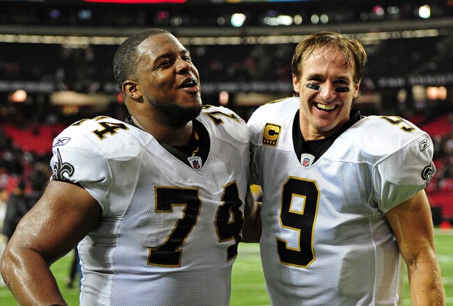 ATLANTA, GA - NOVEMBER 13: Drew Brees #9 of the New Orleans Saints celebrates with Jermon Bushrod #74 after the game against the Atlanta Falcons at the Georgia Dome on November 13, 2011 in Atlanta, Georgia. (Photo by Scott Cunningham/Getty Images)
