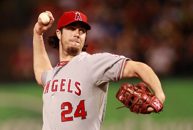 ARLINGTON, TX - AUGUST 26: Dan Haren #24 of the Los Angeles Angels of Anaheim delivers a pitch to the Texas Rangers at Rangers Ballpark in Arlington on August 26, 2011 in Arlington, Texas. (Photo by Rick Yeatts/Getty Images)