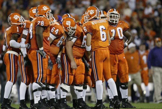 CLEMSON, SC - NOVEMBER 8:  Quarterback Charlie Whitehurst #9 of the Clemson Tigers huddles with his teammates during the game against the Florida State Seminoles on November 8, 2003 at Memorial Stadium in Clemson, South Carolina.  Clemson University defeated Florida State University 26-10. (Photo by Craig Jones/Getty Images)