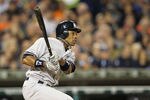 DETROIT, MI - OCTOBER 04:  Curtis Granderson #14 of the New York Yankees hits an RBI double against the Detroit Tigers in the fifth inning of Game Four of the American League Division Series at Comerica Park on October 4, 2011 in Detroit, Michigan.  (Photo by Leon Halip/Getty Images)