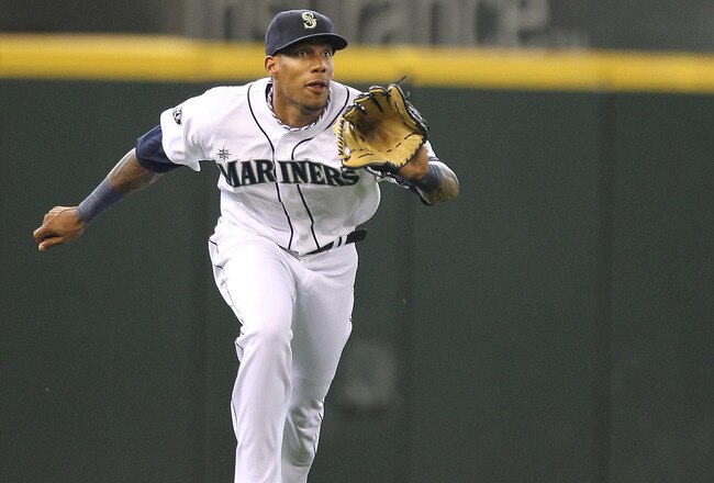 SEATTLE - JULY 17: Left fielder Greg Halman #56 of the Seattle Mariners makes a running catch of a fly ball off the bat of Mitch Moreland of the Texas Rangers in the seventh inning at Safeco Field on July 17, 2011 in Seattle, Washington.  (Photo by Otto Greule Jr/Getty Images)