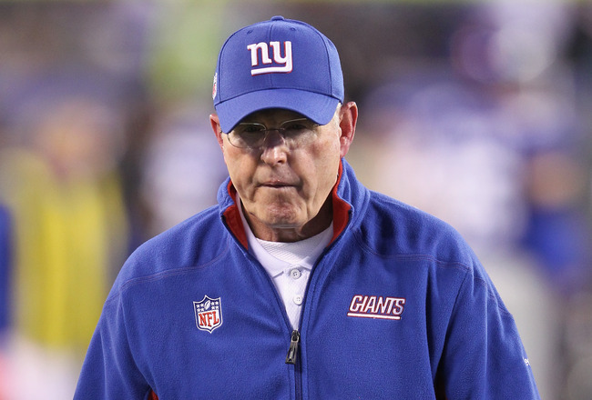 EAST RUTHERFORD, NJ - NOVEMBER 20:  Head coach Tom Coughlin of the New York Giants walks off the field dejected after they Giants lost 17-10 against the Philadelphia Eagles at MetLife Stadium on November 20, 2011 in East Rutherford, New Jersey.  (Photo by Al Bello/Getty Images)