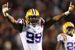 OXFORD, MS - NOVEMBER 19: Sam Montgomery #99 of the LSU Tigers celebrates a play against the Ole Miss Rebels on November 19, 2011 at Vaught-Hemingway Stadium in Oxford, Mississippi.  (Photo by Joe Murphy/Getty Images)