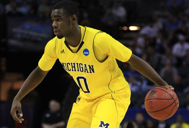 CHARLOTTE, NC - MARCH 20:  Tim Hardaway Jr. #10 of the Michigan Wolverines moves the ball while taking on the Duke Blue Devils during the third round of the 2011 NCAA men's basketball tournament at Time Warner Cable Arena on March 20, 2011 in Charlotte, North Carolina.  (Photo by Streeter Lecka/Getty Images)