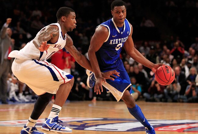 NEW YORK - NOVEMBER 15:  Terrence Jones #3 of the Kentucky Wildcats drives the ball against Thomas Robinson #0 of the Kansas Jayhawks during the 2011 State Farms Champions Classic at Madison Square Garden on November 15, 2011 in New York City.  (Photo by Chris Trotman/Getty Images)