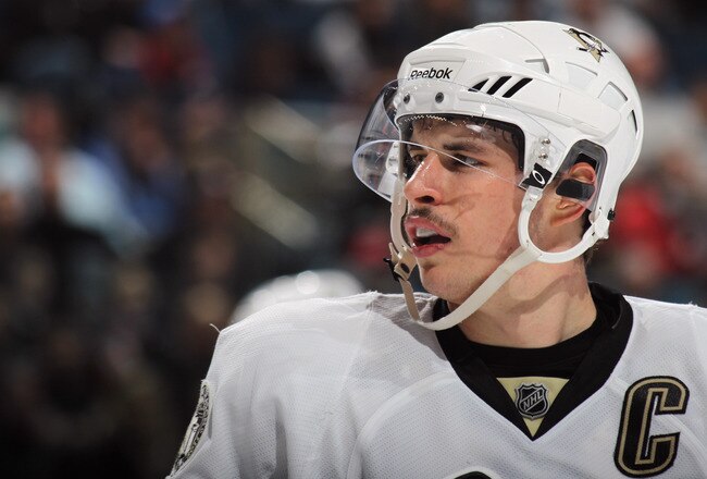 UNIONDALE, NY - DECEMBER 29:  Sidney Crosby #87 of the Pittsburgh Penguins skates against the New York Islanders at the Nassau Coliseum on December 29, 2010 in Uniondale, New York.  (Photo by Bruce Bennett/Getty Images)