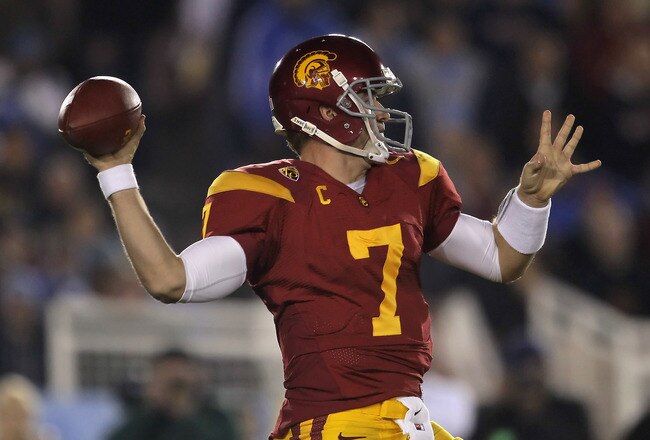PASADENA, CA - DECEMBER 04:  Quarterback Matt Barkley #7 of the USC Trojans drops back to pass against the UCLA Bruins during the first half at the Rose Bowl on December 4, 2010 in Pasadena, California.  (Photo by Jeff Gross/Getty Images)