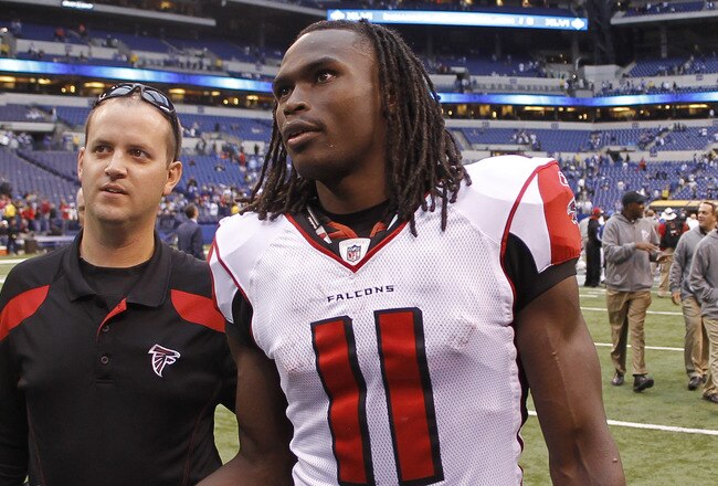 INDIANAPOLIS, IN - NOVEMBER 6: Julio Jones #11 of the Atlanta Falcons looks up at the scoreboard as he leaves the field following the game against the Indianapolis Colts at Lucas Oil Stadium on November 6, 2011 in Indianapolis, Indiana. The Falcons defeated the Colts 31-7. (Photo by Joe Robbins/Getty Images)