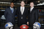DETROIT , MI - JANUARY 16:  Jim Schwartz, center, head coach of the Detroit Lions poses with General Manager Martin Mayhew, left, and Tom Lewand team president after a press conference to introduce him as the Lions new head coach on January 16, 2009 at Ford Field in Detroit, Michigan.  (Photo by Gregory Shamus/Getty Images)
