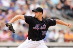 NEW YORK, NY - SEPTEMBER 10:  Chris Capuano #38 of the New York Mets throws a pitch against the Chicago Cubs in the third inning during a game at Citi Field on September 10, 2011 in the Flushing neighborhood of the Queens borough of New York City.  (Photo by Patrick McDermott/Getty Images)
