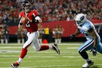 ATLANTA, GA - NOVEMBER 20:  Matt Ryan #2 of the Atlanta Falcons rolls out of the pocket against Malcolm Sheppard #96 of the Tennessee Titans at Georgia Dome on November 20, 2011 in Atlanta, Georgia.  (Photo by Kevin C. Cox/Getty Images)