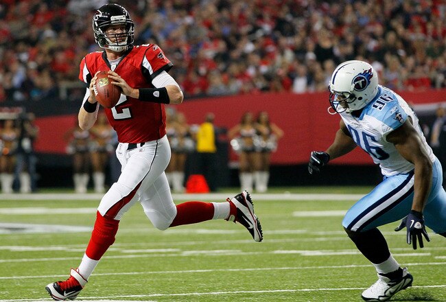 ATLANTA, GA - NOVEMBER 20:  Matt Ryan #2 of the Atlanta Falcons rolls out of the pocket against Malcolm Sheppard #96 of the Tennessee Titans at Georgia Dome on November 20, 2011 in Atlanta, Georgia.  (Photo by Kevin C. Cox/Getty Images)