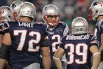 FOXBORO, MA - NOVEMBER 21:   Tom Brady #12 of the New England Patriots huddles with teammates against the Kansas City Chiefs in the second half at Gillette Stadium on November 21, 2011 in Foxboro, Massachusetts. (Photo by Jim Rogash/Getty Images)