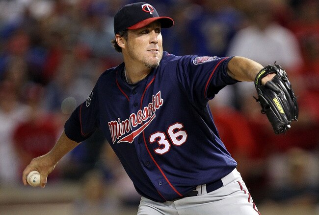 ARLINGTON, TX - JULY 26:  Joe Nathan #36 of the Minnesota Twins throws against the Texas Rangers  at Rangers Ballpark in Arlington on July 26, 2011 in Arlington, Texas.  (Photo by Ronald Martinez/Getty Images)