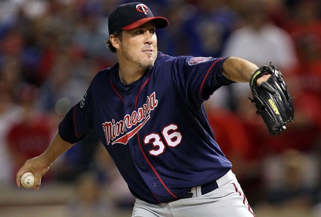 ARLINGTON, TX - JULY 26:  Joe Nathan #36 of the Minnesota Twins throws against the Texas Rangers  at Rangers Ballpark in Arlington on July 26, 2011 in Arlington, Texas.  (Photo by Ronald Martinez/Getty Images)