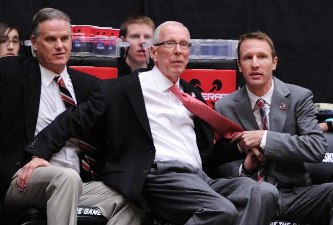 TUCSON, AZ - MARCH 19:  Head coach Steve Fisher (C) of the San Diego State Aztecs stumbles during their game against the Temple Owls during the third round of the 2011 NCAA men's basketball tournament at McKale Center on March 19, 2011 in Tucson, Arizona.  (Photo by Harry How/Getty Images)