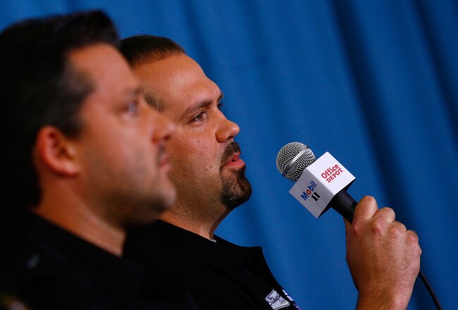 CHARLOTTE, NC - JANUARY 24: Darian Grubb (R), crew chief for Tony Stewart (L), driver of the #14 Office Depot Chevrolet, speaks to the media during the NASCAR Sprint Media Tour hosted by Charlotte Motor Speedway, held at Stewart-Haas Racing on January 24, 2011 in Concord, North Carolina. (Photo by Jason Smith/Getty Images for NASCAR)
