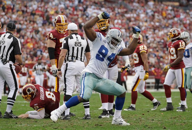 LANDOVER, MD - NOVEMBER 20:  DeMarcus Ware #94 of the Dallas Cowboys celebrates after sacking  Rex Grossman #8 of the Washington Redskins during the second half at FedExField on November 20, 2011 in Landover, Maryland.  (Photo by Rob Carr/Getty Images)