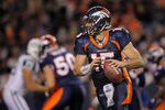 DENVER, CO - NOVEMBER 17:  Quarterback Tim Tebow #15 of the Denver Broncos rolls out against the New York Jets at Sports Authority Field at Mile High on November 17, 2011 in Denver, Colorado. Tebow went on to score the game winning touchdown as the Broncos defeated the Jets 17-13.  (Photo by Doug Pensinger/Getty Images)
