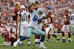 LANDOVER, MD - NOVEMBER 20:  DeMarcus Ware #94 of the Dallas Cowboys celebrates after sacking  Rex Grossman #8 of the Washington Redskins during the second half at FedExField on November 20, 2011 in Landover, Maryland.  (Photo by Rob Carr/Getty Images)