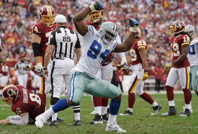 LANDOVER, MD - NOVEMBER 20:  DeMarcus Ware #94 of the Dallas Cowboys celebrates after sacking  Rex Grossman #8 of the Washington Redskins during the second half at FedExField on November 20, 2011 in Landover, Maryland.  (Photo by Rob Carr/Getty Images)