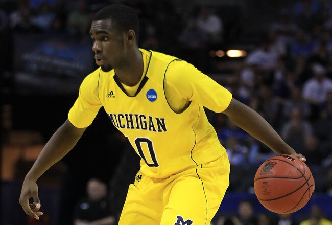 CHARLOTTE, NC - MARCH 20:  Tim Hardaway Jr. #10 of the Michigan Wolverines moves the ball while taking on the Duke Blue Devils during the third round of the 2011 NCAA men's basketball tournament at Time Warner Cable Arena on March 20, 2011 in Charlotte, North Carolina.  (Photo by Streeter Lecka/Getty Images)