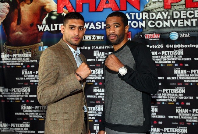 WASHINGTON, DC - OCTOBER 6: Super Lightweight World Champion Amir Khan (L) and Lamont Peterson pose for a picture during a press conference for their upcoming fight at the W Hotel on October 6, 2011 in Washington, DC. (Photo by Ned Dishman/Getty Images)
