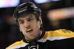 BOSTON, MA - OCTOBER 27:  Milan Lucic #17 of the Boston Bruins looks on in the third period against the Montreal Canadiens on October 27, 2011 at TD Garden in Boston, Massachusetts. The Montreal Canadiens defeated the Boston Bruins 2-1.  (Photo by Elsa/Getty Images)