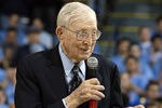 WESTWOOD, CA - DECEMBER 20:  Former UCLA coach John Wooden adresses the fans during a ceremony to name the court at Pauley Pavilion Nell and John Wooden Court prior to the start of UCLA's game against Michigan State on December 20, 2003 in Westwood, California. UCLA won the game 64-58.  (Photo by Jeff Gross/Getty Images)