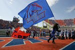 BOISE, ID - OCTOBER 01:  Boise State Broncos mascot Buster Bronco runs a flag onto the field before the game against the Nevada Wolf Pack at Bronco Stadium on October 1, 2011 in Boise, Idaho.  (Photo by Otto Kitsinger III/Getty Images)