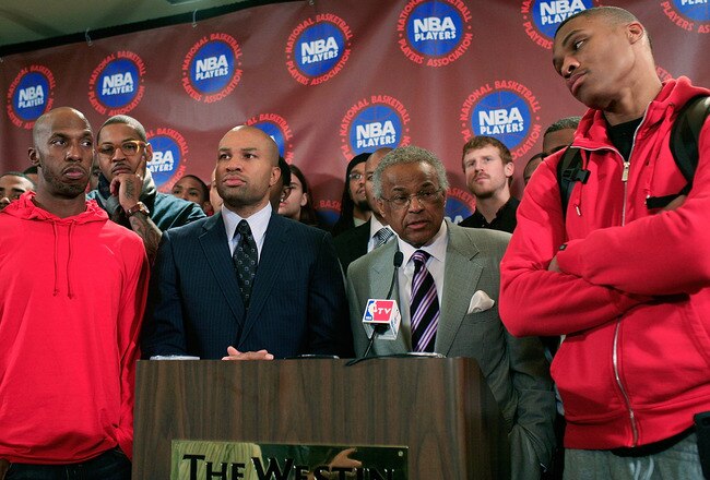 NEW YORK, NY - NOVEMBER 14:  Billy Hunter, Executive Director of the National Basketball Players Association and Derek Fisher, President of the National Basketball Players Association speak at a press conference after National Basketball Players Association  met to discuss the current CBA offer at Westin Times Square on November 14, 2011 in New York City.  (Photo by Patrick McDermott/Getty Images)